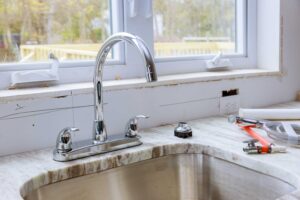 plumber-pipe-connection-installation-of-the-faucet