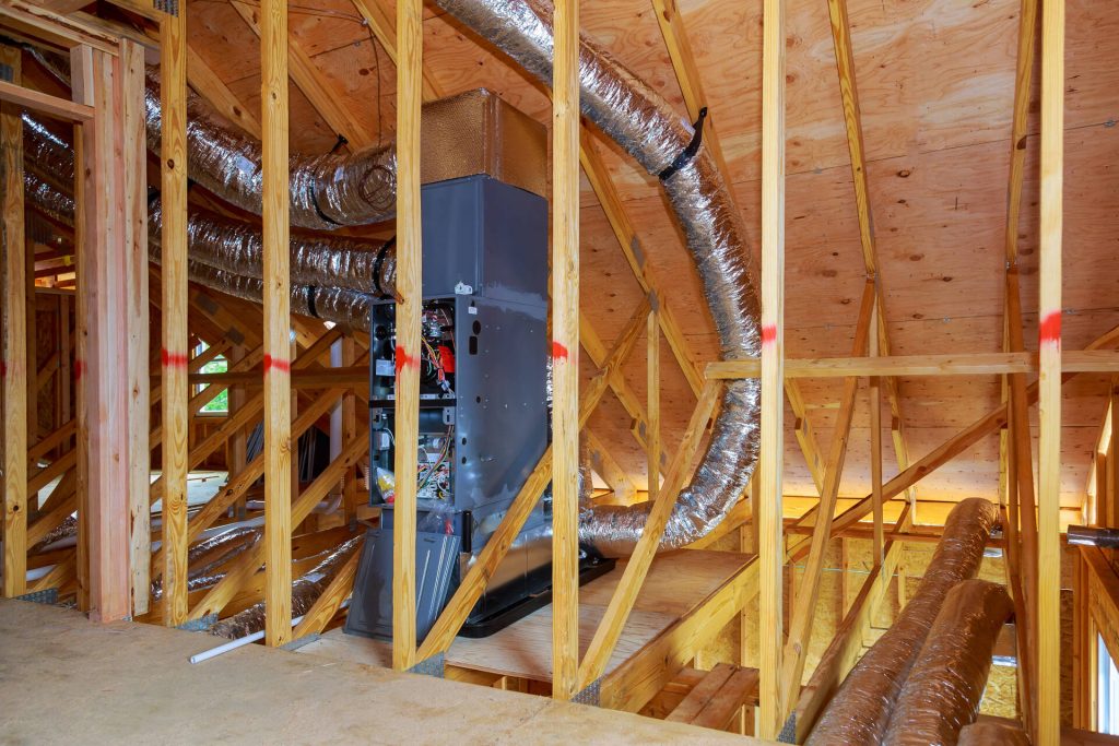 installation of heating system on the roof of the pipe system of heating closeup